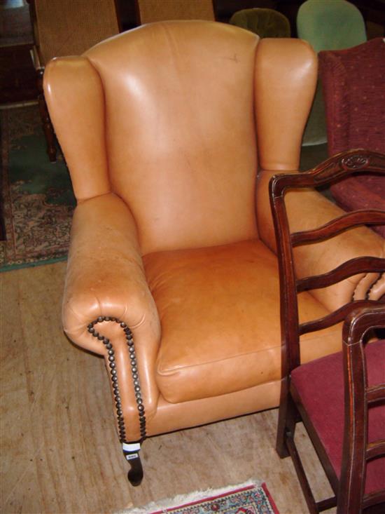 Leather wing back armchair